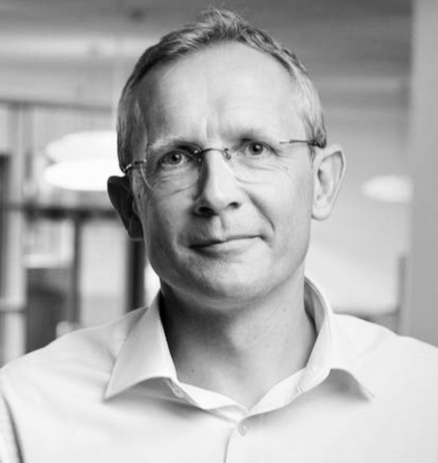 Tim_Minshall A black and white photo of Tim Minshall