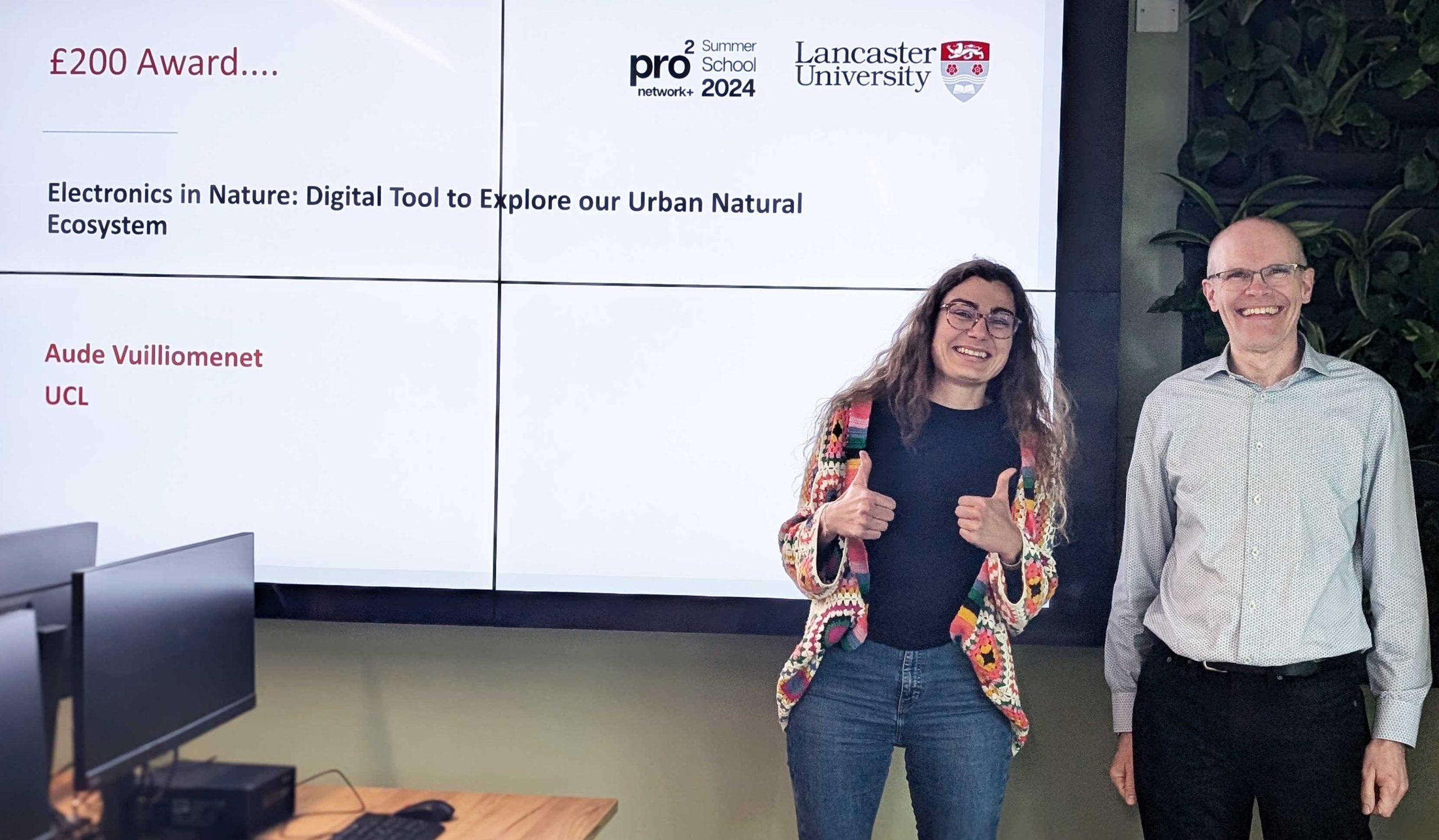 Aude_Vuilliomenet A summer school prize winner poses with Steve Hodges in a computer lab.