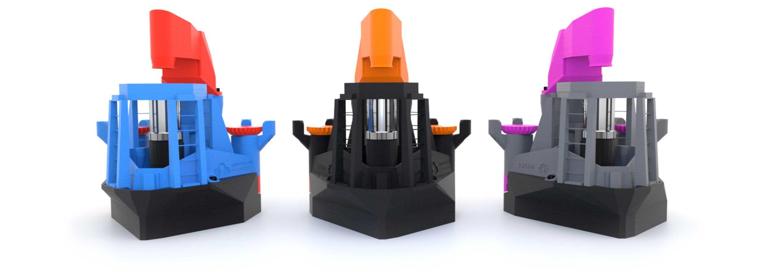 openflexure A photo of three OpenFlexure microscopes which have been 3D printed in bright colours against a white background.